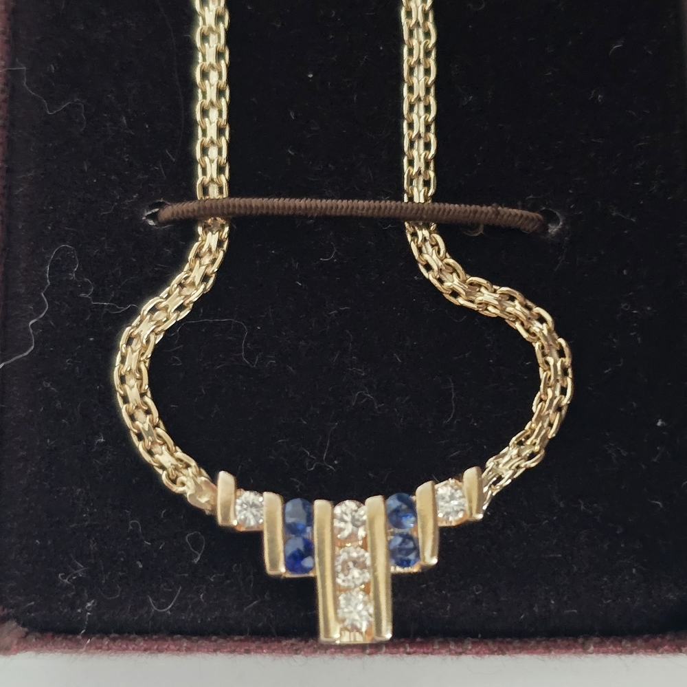 Channel set 14kt gold 18" diamond and sapphire necklace